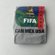 Load image into Gallery viewer, Folded gray sweatshirt with FIFA World Cup branding on a light gray background