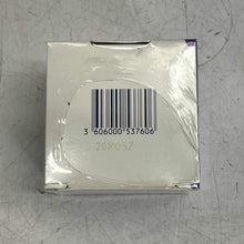 Load image into Gallery viewer, Clear plastic packaging with a barcode on a metallic surface