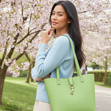 Load image into Gallery viewer, Woman_carrying_green_pebbled_leather_tote_bag_for_work_and_everyday_use