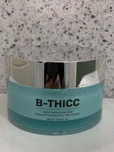 Load image into Gallery viewer, B-Thicc booty enhancing mask jar with silver lid on a speckled background