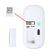Load image into Gallery viewer, White wireless mouse with USB receiver on a white background
