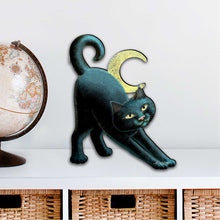 Load image into Gallery viewer, Decorative metal cat sculpture on a white surface with a globe and baskets in the background.
