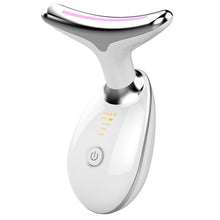Load image into Gallery viewer, White microcurrent neck massager with silver curved head and illuminated controls
