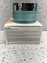 Load image into Gallery viewer, Skincare product with packaging on a textured surface
