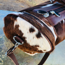 Load image into Gallery viewer, cowhide duffel bag with leather trim and shoulder strap

