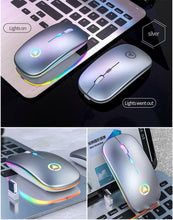 Load image into Gallery viewer, Wireless mouse with light effects on a laptop keyboard
