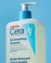 Load image into Gallery viewer, CeraVe SA Smoothing Cleanser bottle on a blue background
